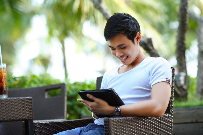 man using tablet